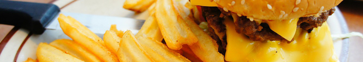 Eating Burger at Burger Lounge restaurant in San Diego, CA.